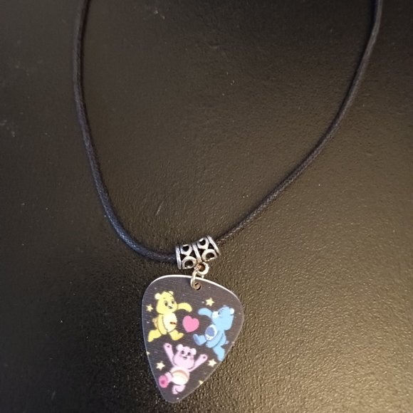 THE CARE BEARS GUITAR PICK NECKLACE - Picture 1 of 1